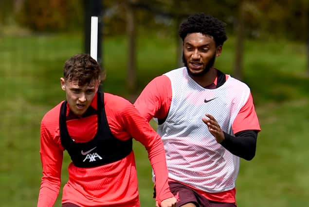 Luke Chambers and Joe Gomez of Liverpool during a pre-season training session at AXA Training Centre on July 05, 2022 in Kirkby, England. (Photo by Andrew Powell/Liverpool FC via Getty Images)