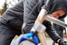 Man stealing a bike. Image: Robert Kneschke - stock.adobe.co