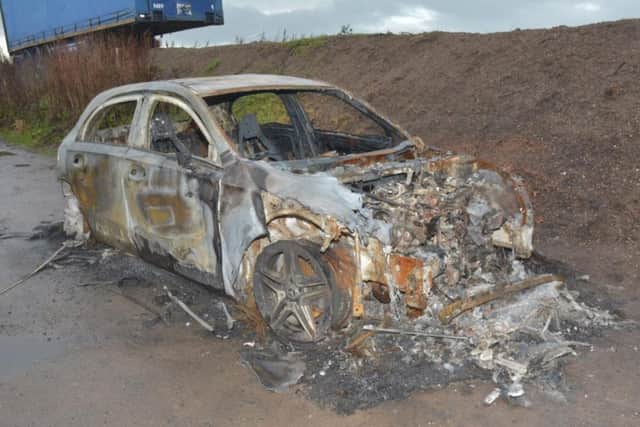 Chapman and Waring travelled to Frodsham, where they burnt out the car.