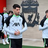 Dominik Szoboszlai and Alexis Mac Allister of Liverpool during a training session at AXA Training Centre on July 12, 2023 in Kirkby, England. (Photo by Andrew Powell/Liverpool FC via Getty Images)