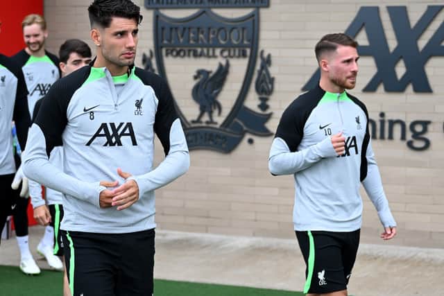 Dominik Szoboszlai and Alexis Mac Allister of Liverpool during a training session at AXA Training Centre on July 12, 2023 in Kirkby, England. (Photo by Andrew Powell/Liverpool FC via Getty Images)