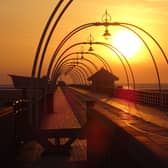 The sun sets over Southport pier. Photo by robin - stock.adobe.com