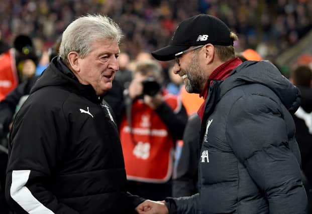 Crystal Palace manager Roy Hodgson with Liverpool boss Jurgen Klopp. Picture: Andrew Powell/Liverpool FC via Getty Images