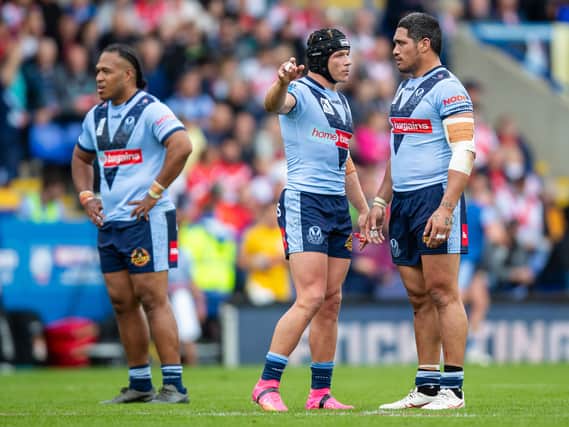 St Helens’ Jonny Lomax gives instructions to Sione Mata’utia during the defeat to Leigh Leopards. Image: Jess Hornby/Getty Images