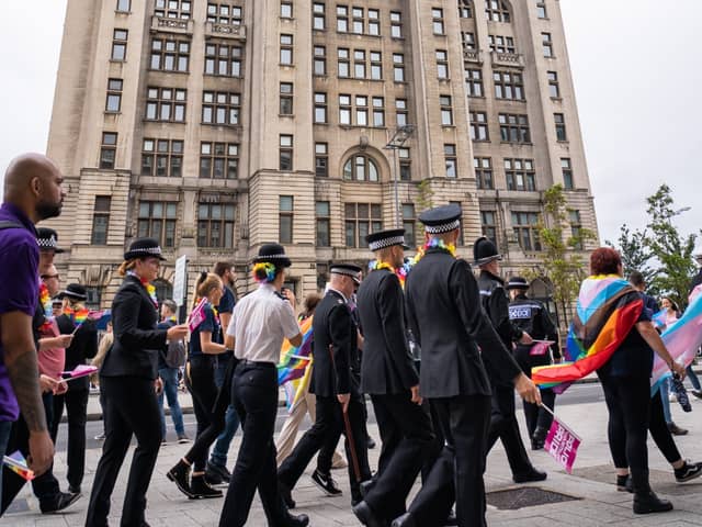 Pride march in front of the Liver Building. Photo by Merseyside Police.