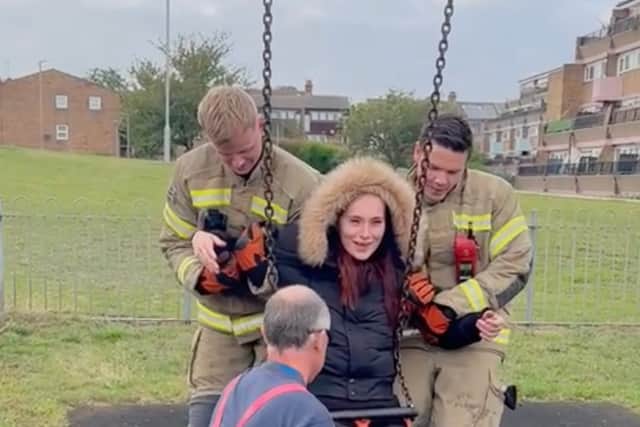 Firefighters have come to the rescue of a mum who found herself stuck in a baby swing for hours