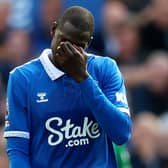 Abdoulaye Doucoure of Everton looks dejected after the team conceded the first goal during the Premier League match between Everton FC and Fulham FC at Goodison Park on August 12, 2023 in Liverpool, England. (Photo by Nathan Stirk/Getty Images)