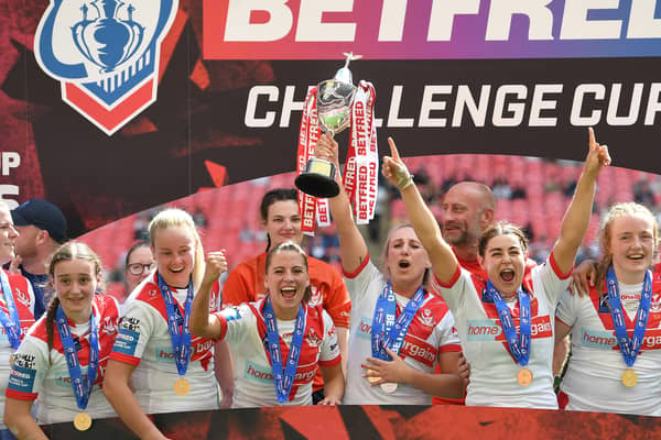 St Helens players celebrate with the trophy after winning the Betfred Women’s Challenge Cup Final match against Leeds Rhinos at Wembley Stadium. Image: Tony Marshall/Getty Images
