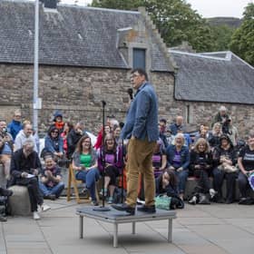 Graham Linehan performs outside Scottish Parliament days after Edinburgh Fringe cancelled Father Ted creator