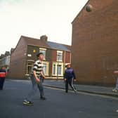 Children play street football in Liverpool. Image: Allsport UK /Allsport