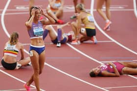 Katarina Johnson-Thompson of Team GB celebrates her win as Anna Hall lays on the ground at the 2023 World Athletics Championship. Image: Steph Chambers/Getty Images