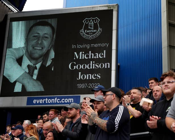 Everton supporters take part in a minute's applause in remembrance of Blues fan, Michael Jones. Image: Lewis Storey/Getty Images