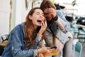 Two female best friends laughing. Image: Drobot Dean - stock.adobe.com