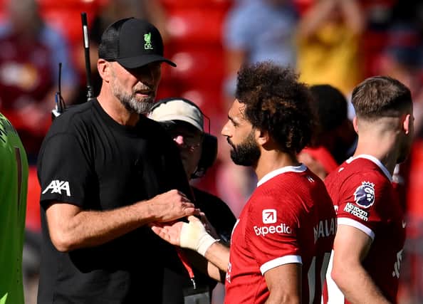  Jurgen Klopp manager of Liverpool with Mohamed Salah of Liverpool at the end of the Premier League match between Liverpool FC and Aston Villa at Anfield on September 03, 2023 in Liverpool, England. (Photo by Andrew Powell/Liverpool FC via Getty Images)