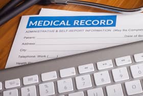 Stethoscope resting on a sheet of medical insurance records. Image: danielfela - stock.adobe.com