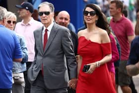 Liverpool owner John Henry with wife Linda Pizzuti Henry. Picture: HENRY NICHOLLS/AFP via Getty Images