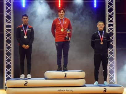 Zak Perzamanos wins gold at the Trampoline, Tumbling & DMT British Championships. Image: British Gymnastics