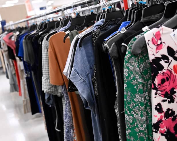 Clothes hanging in shop Picture: Getty