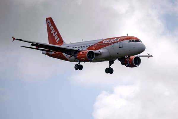 An easyJet aircraft comes in to land.(Photo by Ben Stansall / AFP) (Photo by BEN STANSALL/AFP via Getty Images)