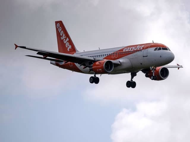 An easyJet aircraft comes in to land.(Photo by Ben Stansall / AFP) (Photo by BEN STANSALL/AFP via Getty Images)