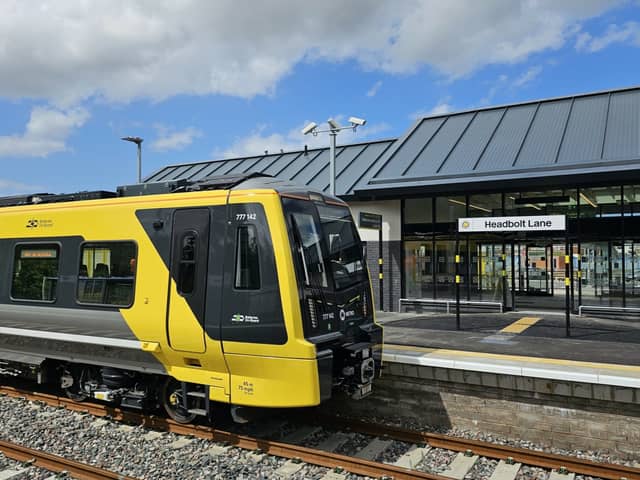 A battery powered train pulling into the new Headbolt Lane station. Photo: Liverpool City Region Combined Authority