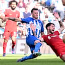  Dominik Szoboszlai of Liverpool brought down in the penalty area during the Premier League match between Brighton & Hove Albion and Liverpool FC at American Express Community Stadium on October 08, 2023 in Brighton, England. (Photo by Andrew Powell/Liverpool FC via Getty Images)