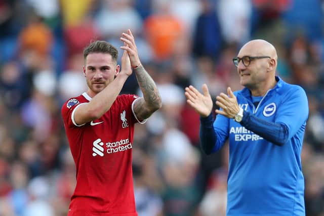 Alexis Mac Allister of Liverpool applauds the fans following the Premier League match between Brighton & Hove Albion and Liverpool FC at American Express Community Stadium on October 08, 2023 in Brighton, England. (Photo by Steve Bardens/Getty Images)