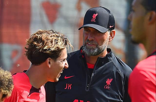 Jurgen Klopp manager of Liverpool with Kostas Tsimikas of Liverpool during a training session. Picture: John Powell/Liverpool FC via Getty Images)