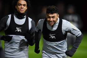  Alex Oxlade-Chamberlain of Liverpool with Trent Alexander-Arnold of Liverpool during a training session at AXA Training Centre on November 23, 2021 in Kirkby, England. (Photo by John Powell/Liverpool FC via Getty Images)