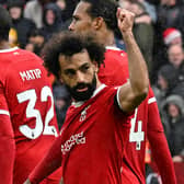Mohamed Salah of Liverpool celebrates after scoring the second goal during the Premier League match between Liverpool FC and Everton FC at Anfield on October 21, 2023 in Liverpool, England. (Photo by John Powell/Liverpool FC via Getty Images)