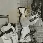 Nurses putting up Christmas decorations in their new home at St. Katherine ‘s College, Taggart Avenue, Liverpool in 1939. 