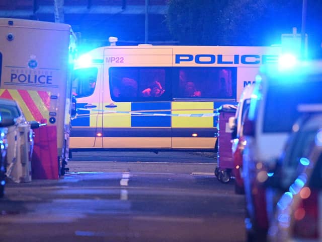 Merseyside Police cordon off a street. Image: OLI SCARFF/AFP via Getty Images
