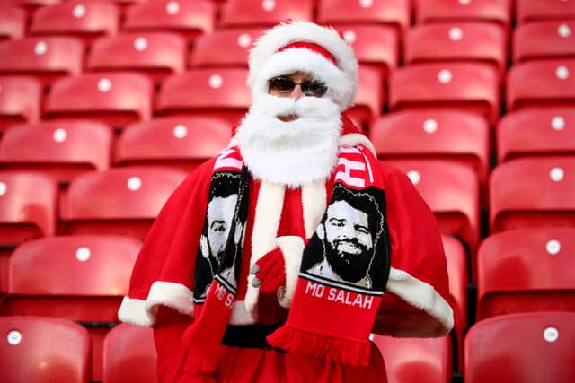 Liverpool fans have opposed the moving of a match to Christmas Eve (Image: Getty Images)