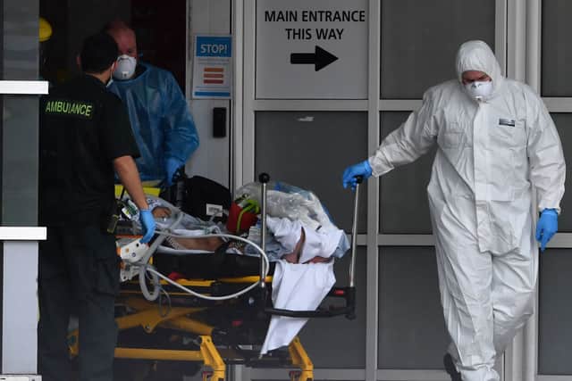 Staff wear personal protective equipment (PPE) as they work at the Royal Liverpool University Hospital in April 2020. Image: PAUL ELLIS/AFP via Getty Images