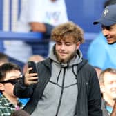 Dele poses with an Everton fan at Goodison Park. Picture: Jan Kruger/Getty Images
