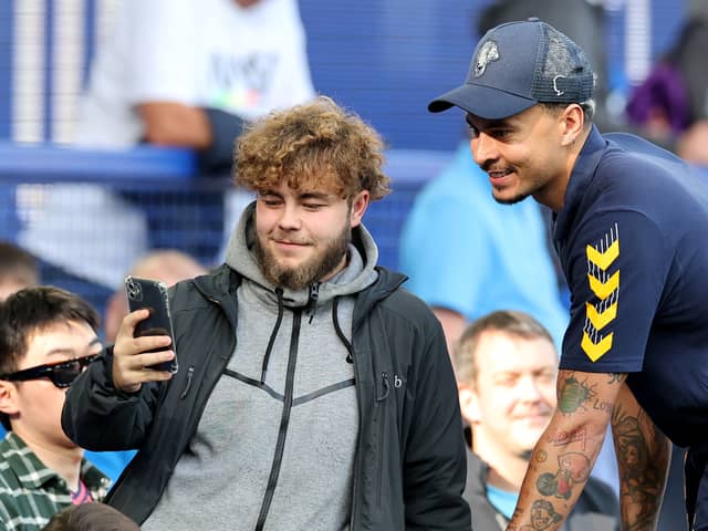 Dele poses with an Everton fan at Goodison Park. Picture: Jan Kruger/Getty Images