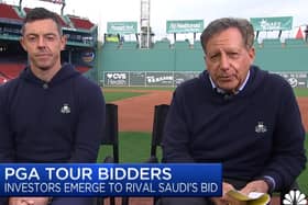 Liverpool and FSG chairman Tom Werner, right, with Rory McIlroy at Fenway Park. Picture: CNBC Halftime Report/ X
