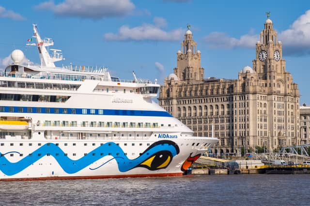 Cruiser ship docked at the Port of Liverpool with a view of the iconic Royal Liver Building. Image: kmiragaya - stock.adobe.com