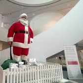 The 18 foot Blackler's Santa stands in the Museum of Liverpool’s Atrium and greets visitors with his jumbo smile