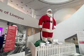 The 18 foot Blackler's Santa stands in the Museum of Liverpool’s Atrium and greets visitors with his jumbo smile