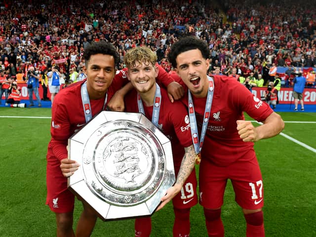 From left: Fabio Carvalho, Harvey Elliott and Curtis Jones celebrate Liverpool's 2022 Community Shield triumph. Picture: Andrew Powell/Liverpool FC via Getty Images
