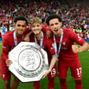 From left: Fabio Carvalho, Harvey Elliott and Curtis Jones celebrate Liverpool's 2022 Community Shield triumph. Picture: Andrew Powell/Liverpool FC via Getty Images