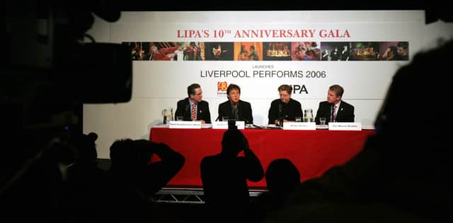 Former Beatle, Sir Paul McCartney (2nd L) speaks during a press conference in  2006 to celebrate the tenth anniversary of the Liverpool Institute of Performing Arts. Image: PAUL ELLIS/AFP via Getty Images