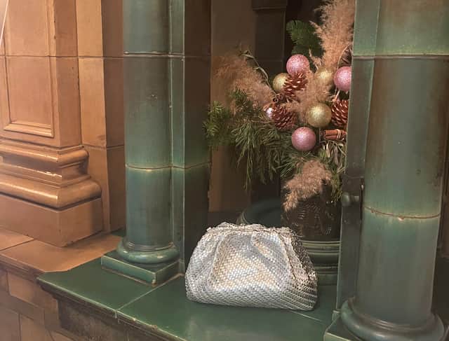 NationalWorld reporter Rochelle Barrand stayed at the Kimpton Clocktower hotel to experience the brand's new Anthropologie partnership. Pictured is a bag from the fashion brand which she borrowed from the hotel during her stay, against one of the hotel's pretty decorative displays. Photo by Rochelle Barrand.