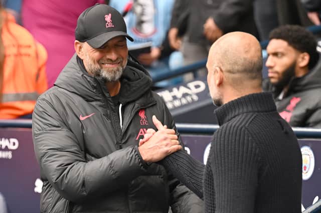 Liverpool manager Jurgen Klopp with Man City boss Pep Guardiola. Picture: 