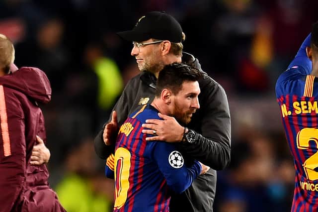 Liverpool manager Jurgen Klopp with Lionel Messi. Picture: Andrew Powell/Liverpool FC via Getty Images