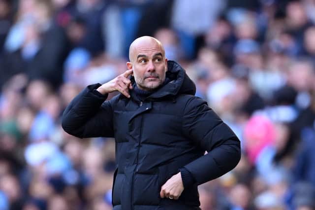  Pep Guardiola, Manager of Manchester City, gestures during the Premier League match between Manchester City and Liverpool FC at Etihad Stadium on November 25, 2023 in Manchester, England. (Photo by Michael Regan/Getty Images)