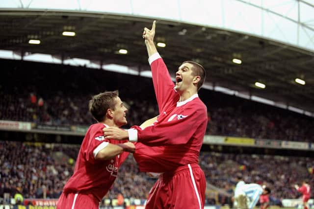 Dominic Matteo celebrates scoring for Liverpool with Michael Owen. Picture: Clive Mason /Allsport