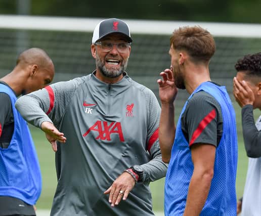 Jurgen Klopp speaks with Nat Phillips during Liverpool training. Picture: John Powell/Liverpool FC via Getty Images
