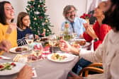 A family eating Christmas dinner. Image: CarlosBarquero/stock.adobe
